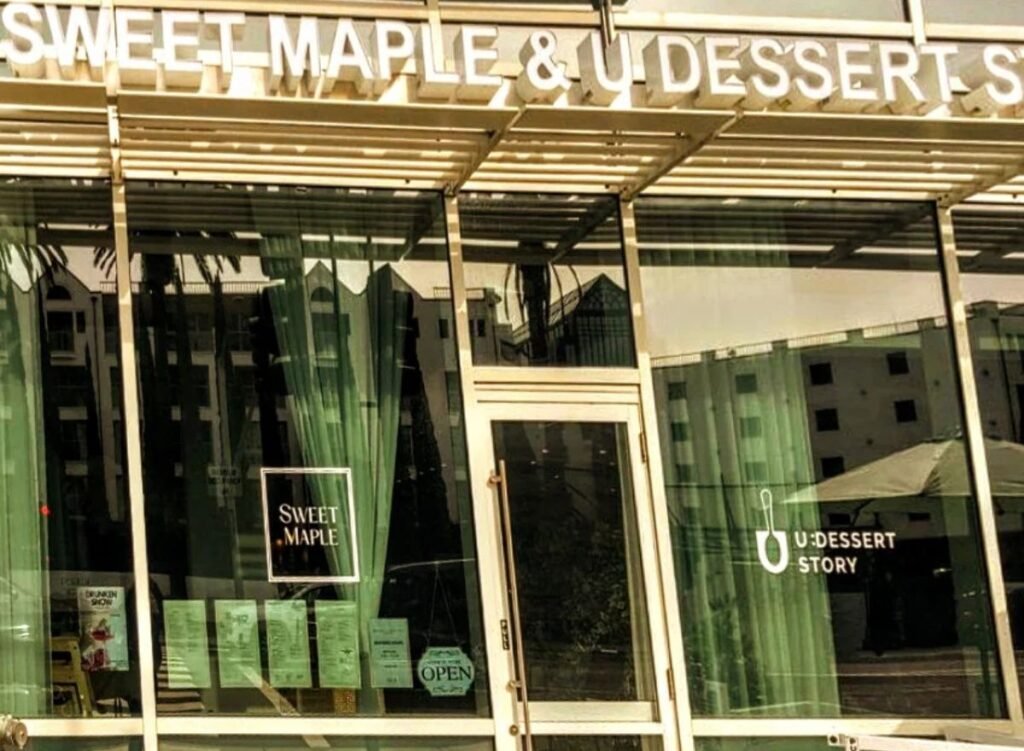 A colorful selection of Asian breakfast foods arranged on a dining table